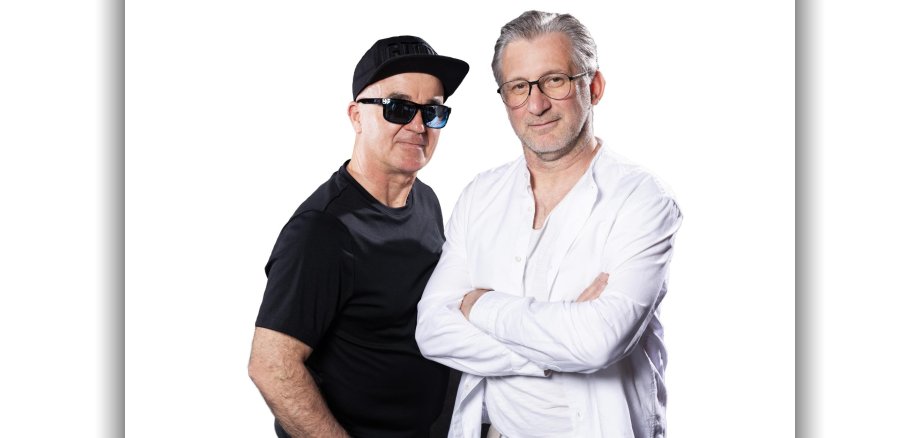 Foto: Ulric Wurschy und Volker Becker vor weißem Hintergrund